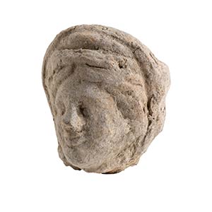 Roman terracotta head of a girl; ... 