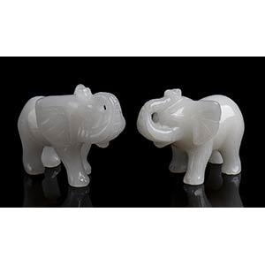 2 snow quartz carvingsdepicting elephants. ... 
