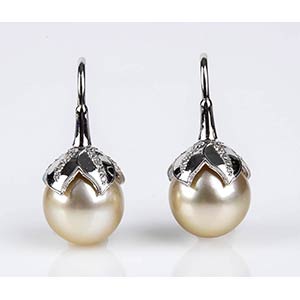 Gold, Australian pearl and diamonds earrings ... 