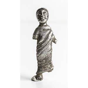Roman silver statuette of a draped youth; ... 