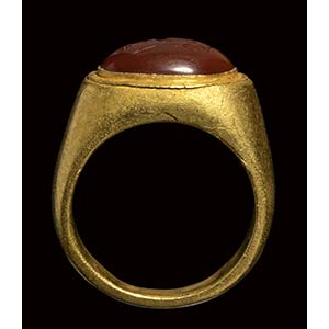 A roman gold ring with carnelian ... 
