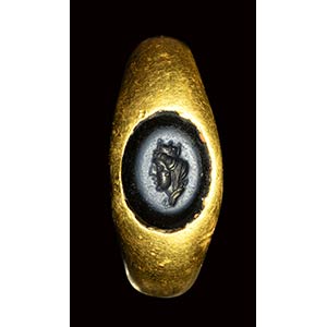 A roman gold ring set with a nicolo ... 
