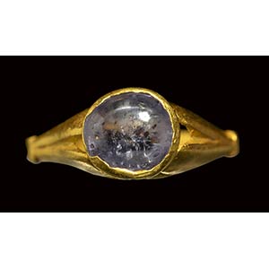 A late roman gold ring set with a cabochon ... 