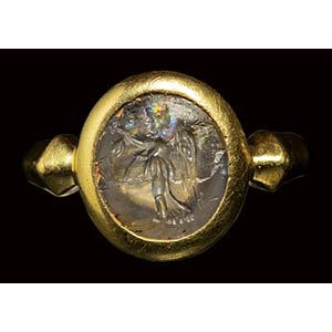 A rare roman sapphire intaglio set in a gold ... 