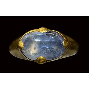 An islamic gold ring set with a large blue ... 
