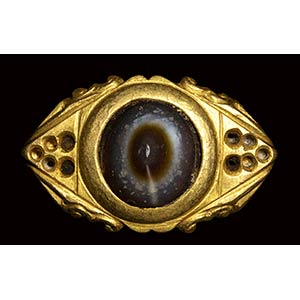 A late roman openwork gold ring set with an ... 
