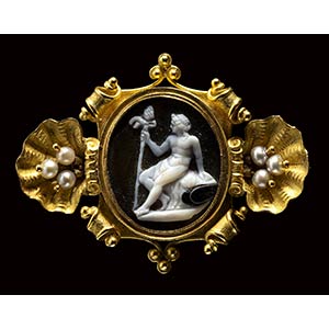 A french onyx cameo set in a gold brooch ... 