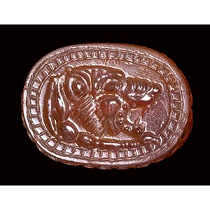 An etruscan carnelian engraved scarab. Lion ... 