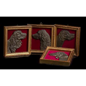 Four framed bronzes (dog portraits)Four ... 