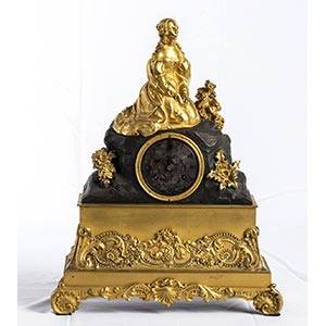 French gilt bronze table clock depicting a ... 