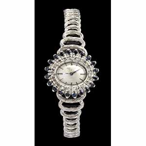 OMEGA: gold and diamonds ladys wristwatch, ... 