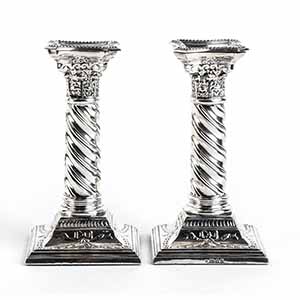 Pair of English sterling silver candlesticks ... 