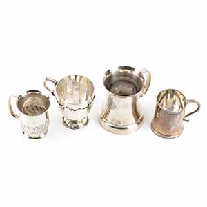Four English sterling silver mugs ... 