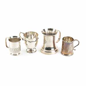 Four English sterling silver mugs - early ... 