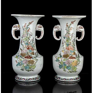 A PAIR OF PORCELAIN VASES WITH POLYCHROME ... 
