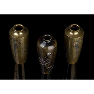 THREE METAL VASES WITH DIFFERENT ... 