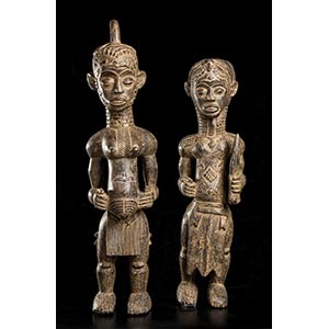 A PAIR OF WOOD FIGURES Ivory ... 