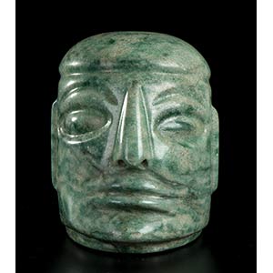 A GREEN JADE HEAD Pre-columbian style10 x ... 