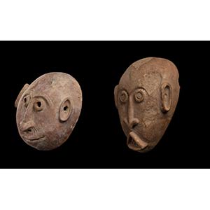 TWO POTTERY MASKS Africa21 x 19 cm ... 