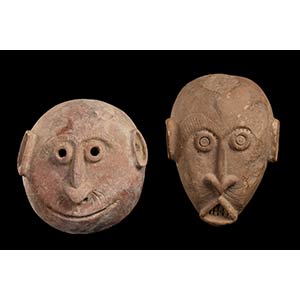 TWO POTTERY MASKS Africa21 x 19 cm the ... 