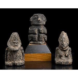 THREE POTTERY AND STONE FIGURES ... 