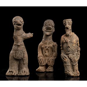 THREE POTTERY FIGURES Africa26 x ... 