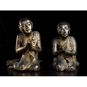 A PAIR OF GLASS INLAID LACQUERED WOOD MONKS  ... 