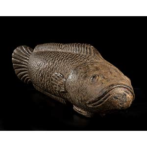 A STONE CARP WITH TRACES OF ... 