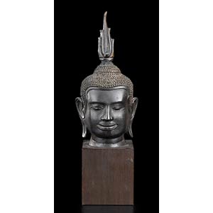 A BRONZE HEAD OF DEITY Khmer style27 x 12 x ... 