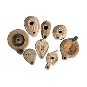 Group of eight Oil Lamps; Greek to Roman, ... 