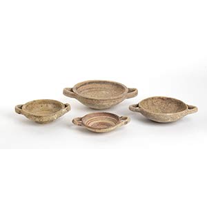 Group of four Daunian double-handled Dishes ... 