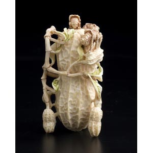 A vegetable carved ivory snuff bottle and ... 