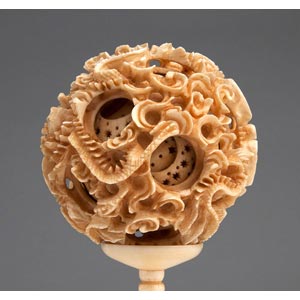 A carved ivory Dragon Puzzle ball ... 