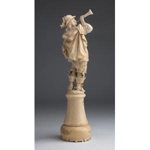 A carved ivory figure of a bugler ... 