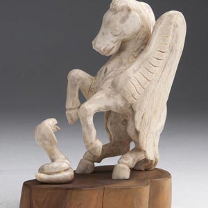A carved ivory figural group ... 