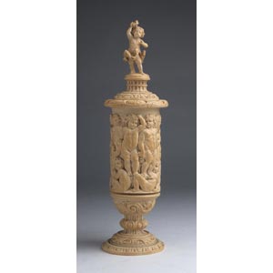 An ivory chalice ornately carved with Putti ... 