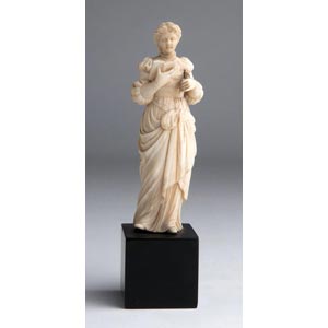 A carved ivory figure of a lady - England, ... 