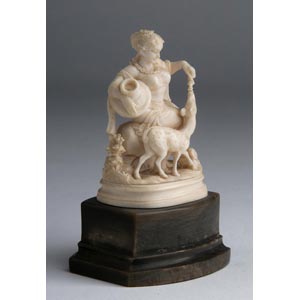 A carved ivory figure of a lady ... 