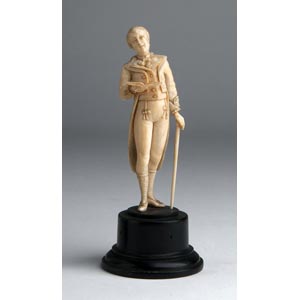 A carved ivory figure of a gentleman - ... 