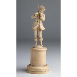 A carved ivory figure of musician - probably ... 