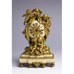 A gilt bronze and ivory Mantel Clock -  ... 