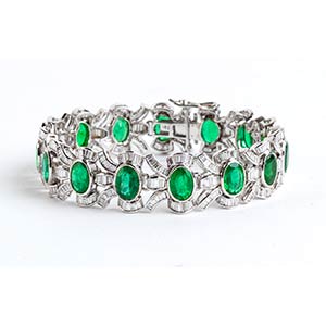 Gold bracelet with emerald line and diamond ... 
