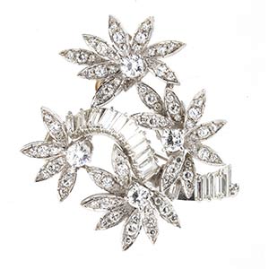 Floral pendant brooch in platinum and ... 