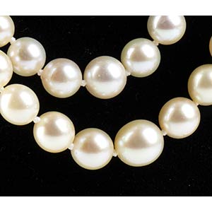 Collana di perle coltivate, rubini ... 