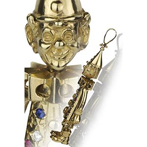 Pinocchio gold and glass paste pendant12k ... 