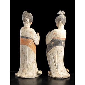A PAIR OF PAINTED POTTERY FIGURES ... 