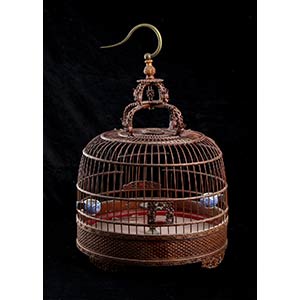 A BAMBOO BIRDCAGE WITH TWO ‘BLUE AND ... 