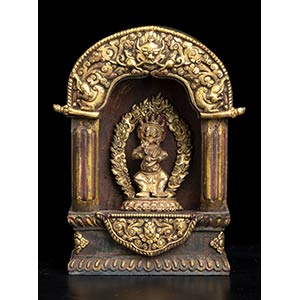 A PAINTED WOOD AND GILT BRONZE SMALL TEMPLE ... 