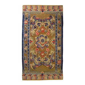A WOOL AND GILT COPPER THREADS CARPET WITH ... 