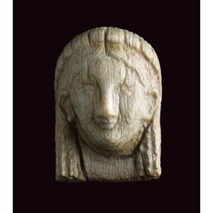 Small Ivory plaque in shape of Kore head ... 